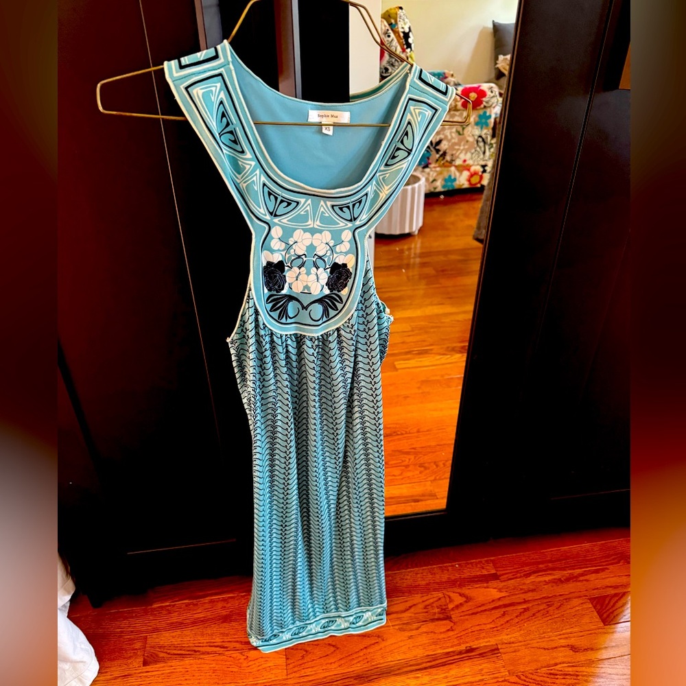 A beautiful dress I was only able to wear it a few times.